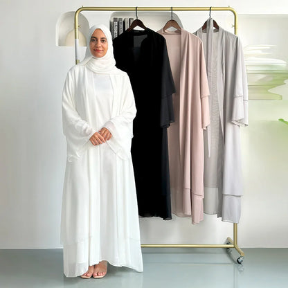 Abaya Élégante à Coupe Fluide et Détails Raffinés